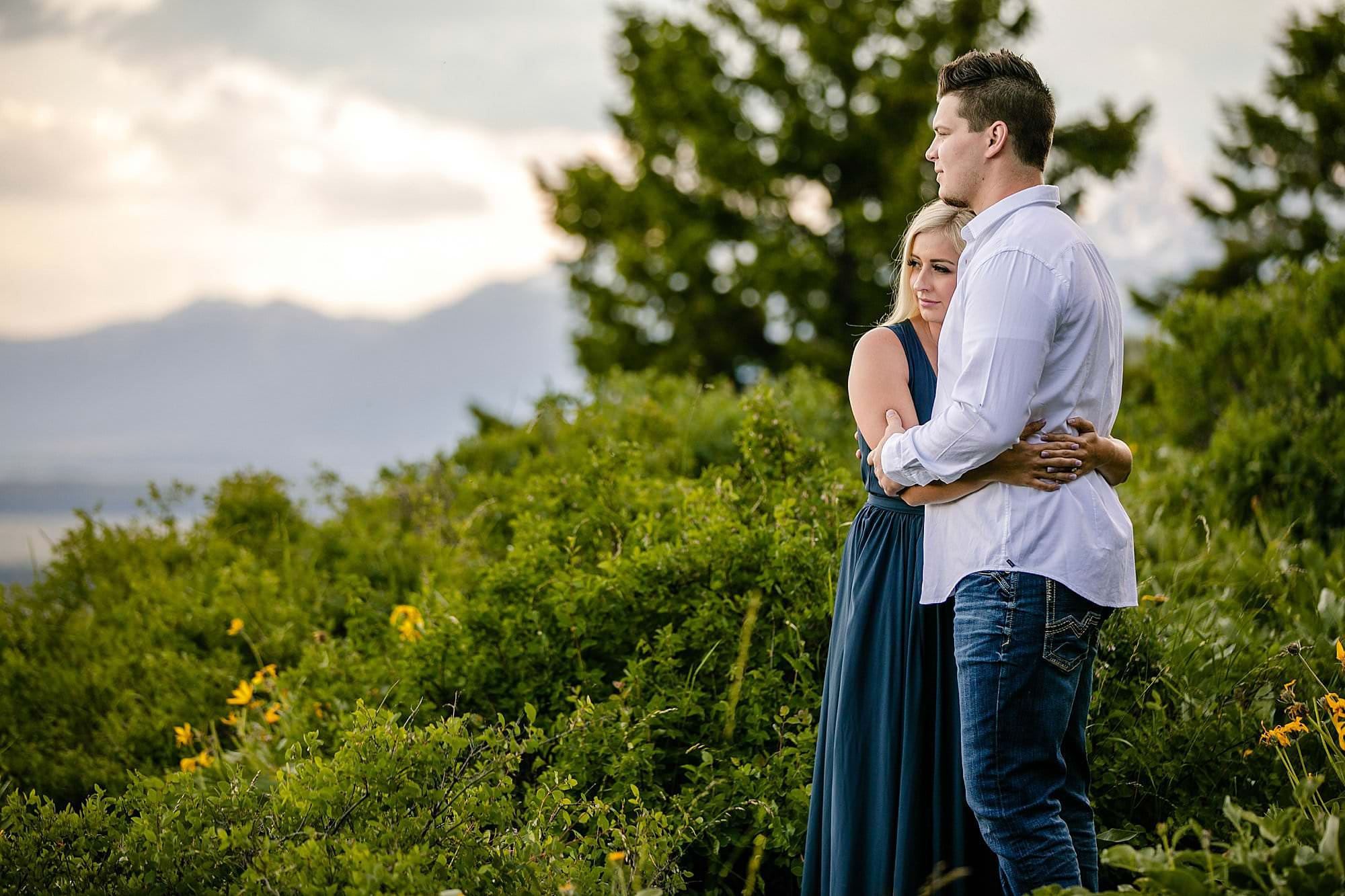 couple hugging on mountaintop