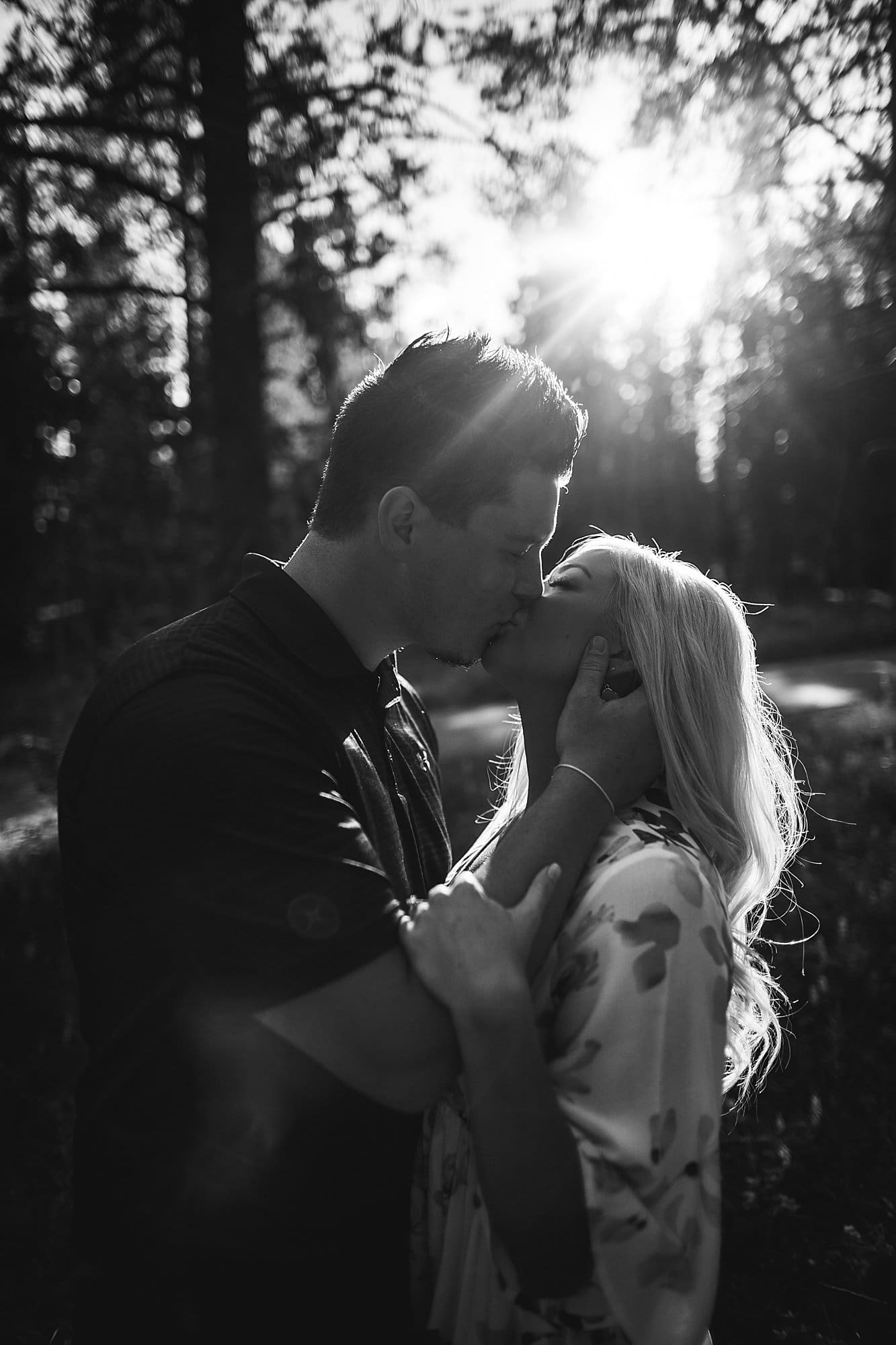 teton engagement session, couple kissing