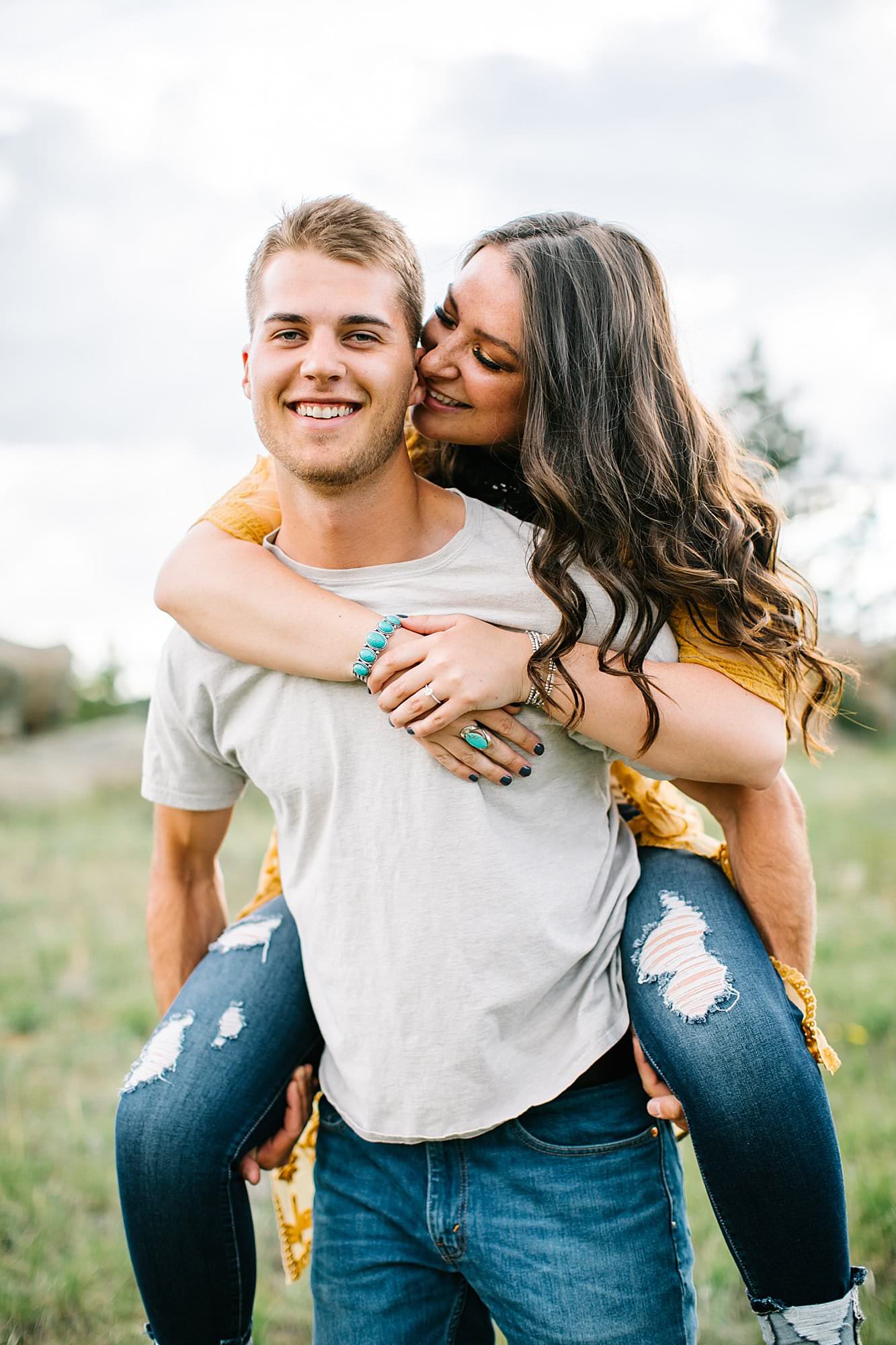 Piggy back ride, engagement couple