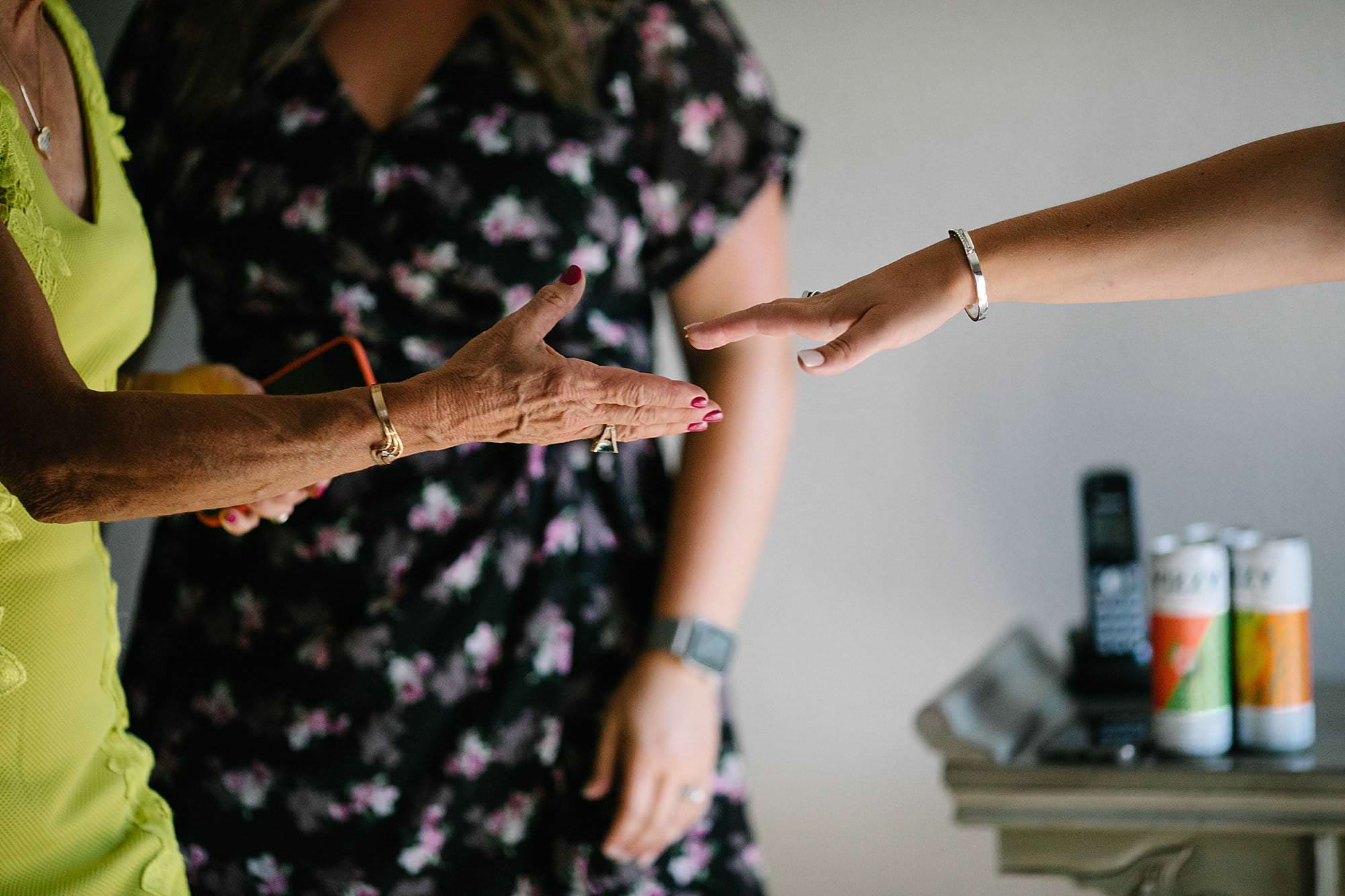 hands during getting ready bride