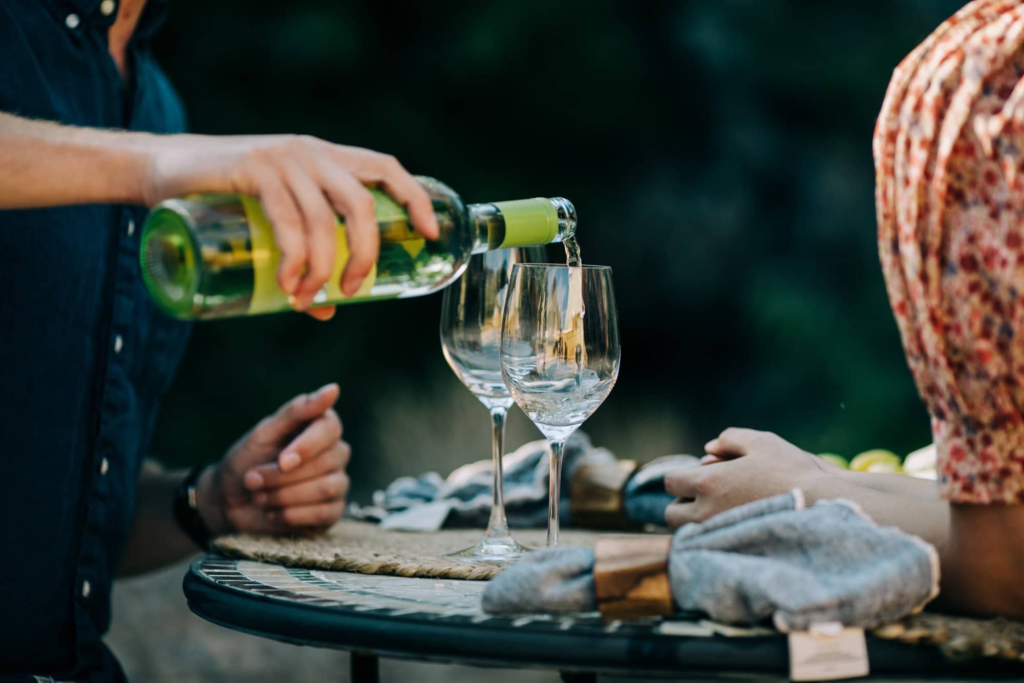 wine during engagement session