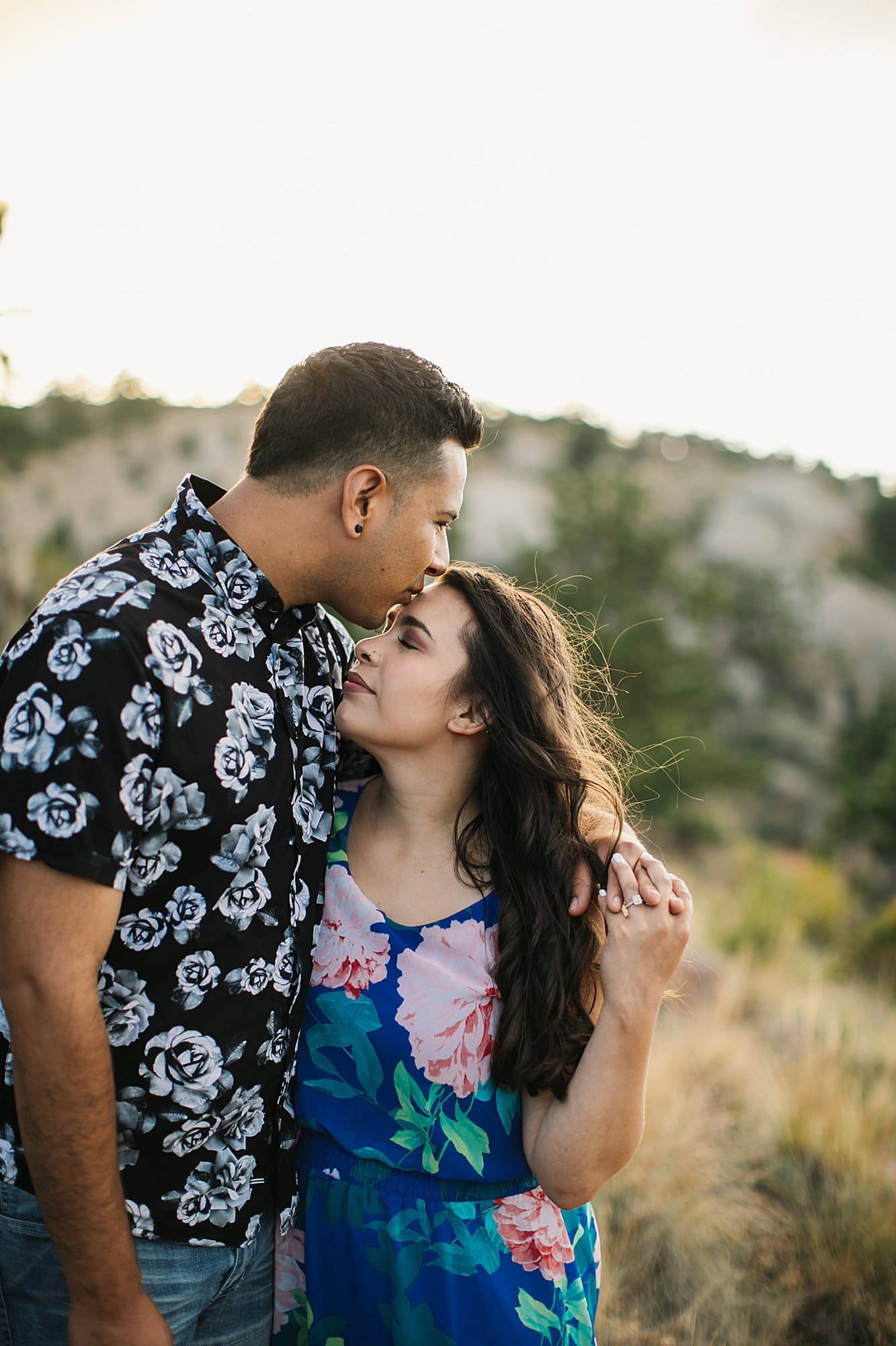 sunset engagement photos, kissing forehead